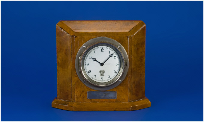 Appraisal: Jaguar Car Clock Made By Smiths Mounted In A Burr