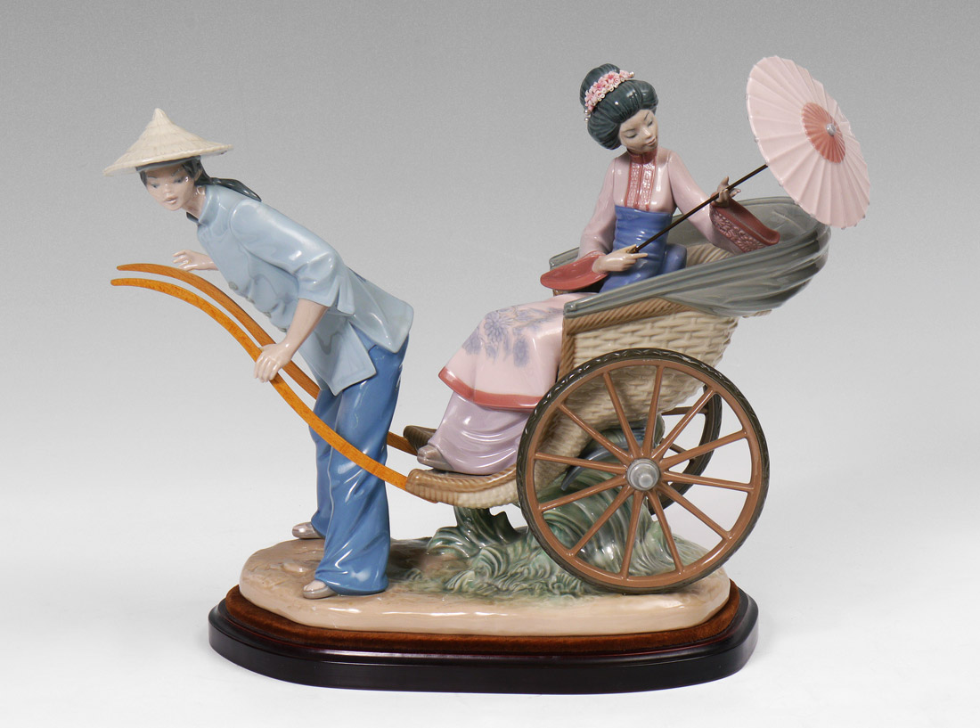 Appraisal: LLADRO PORCELAIN FIGURINE ''A RICKSHAW RIDE'' Salvador Debon sculptor issued