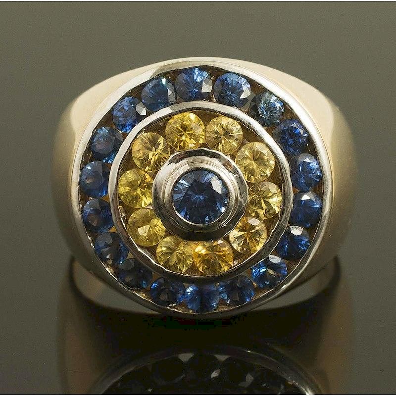 Appraisal: Yellow Blue Sapphire Gold Ring k gold ring containing concentric