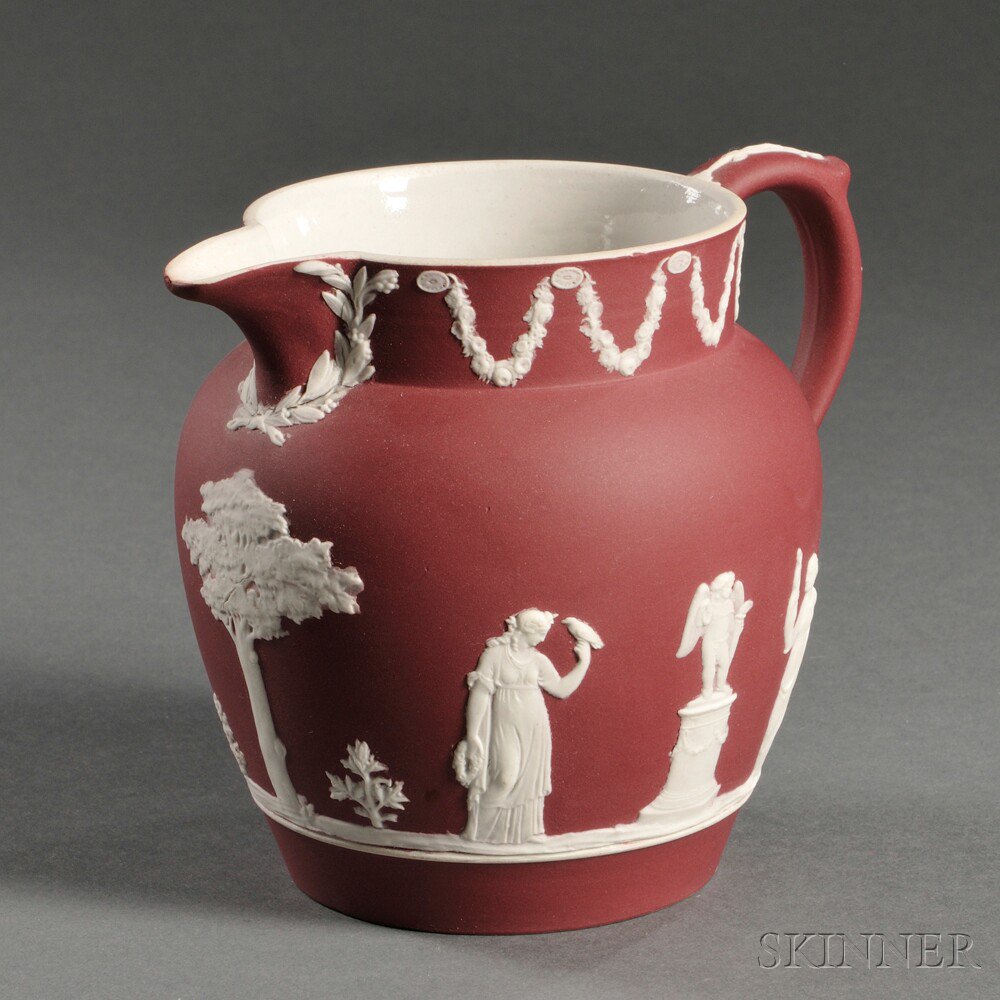 Appraisal: Wedgwood Crimson Jasper Dip Jug England c applied white classical