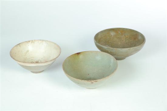 Appraisal: THREE BOWLS China early perhaps Han period pottery Similar footed