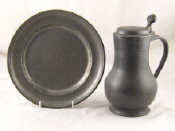 Appraisal: A late th century pewter plate approx cm diameter and