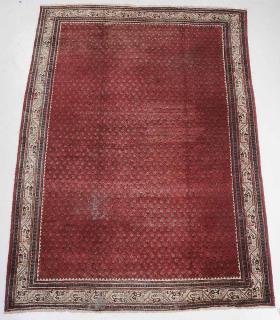 Appraisal: Bijar Style Carpet rows of boteh on red ground ivory