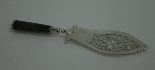 Appraisal: A George III silver fish slice London with green stained