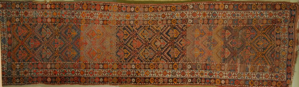 Appraisal: ORIENTAL RUG CAUCASIAN RUNNER ' x ' Geometric elements chevrons