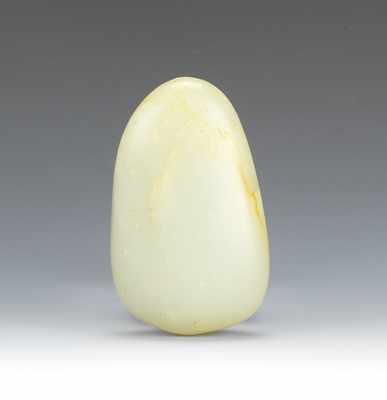 Appraisal: A Plain Carved Jade Pebble Form Softly translucent celadon color