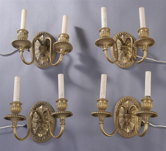 Appraisal: FOUR LOUIS XIV-STYLE BRONZE DOR TWO-LIGHT WALL SCONCES early th