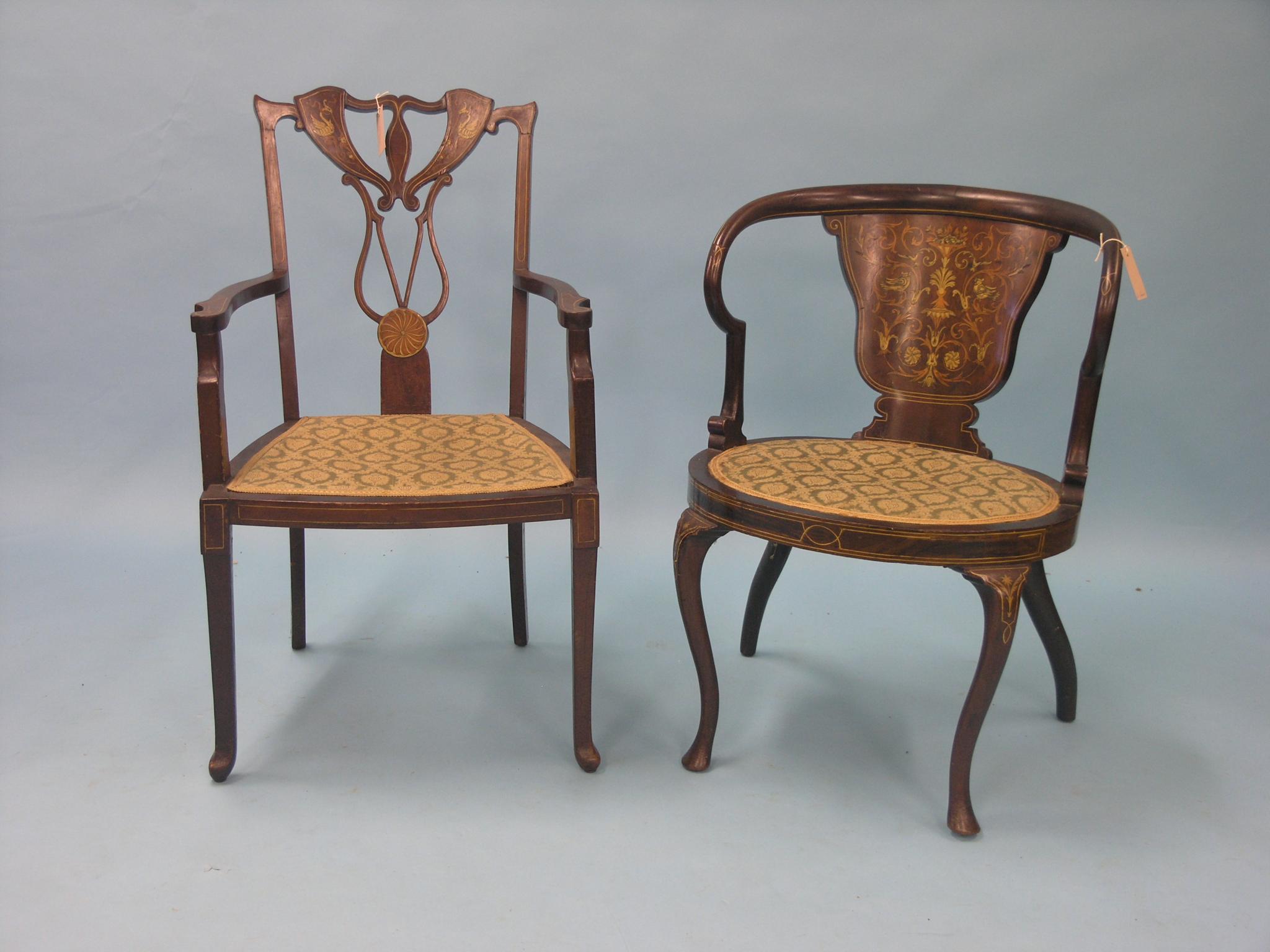 Appraisal: An Edwardian mahogany elbow chair rounded back with broad marquetry