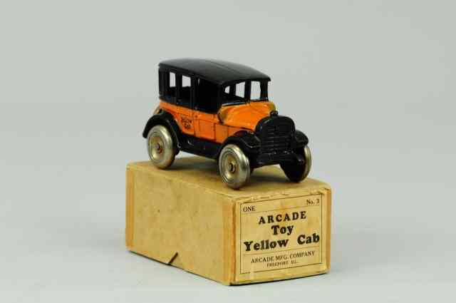 Appraisal: YELLOW CAB WITH BOX Arcade cast iron painted in familiar