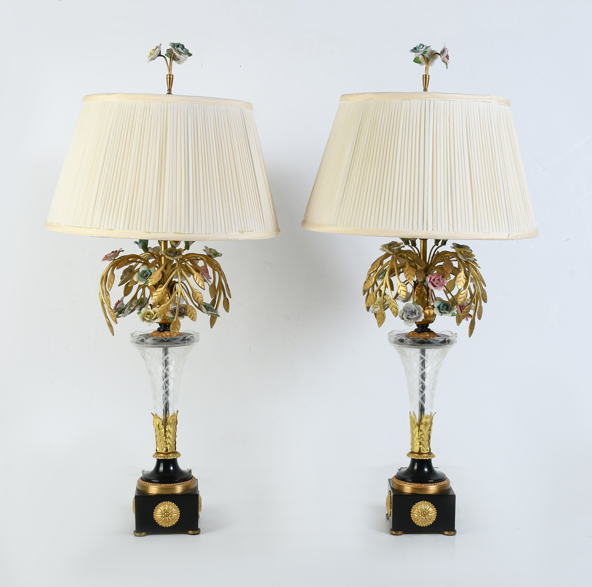 Appraisal: PAIR OF GILT METAL CRYSTAL LAMPS Cut crystal bodies on