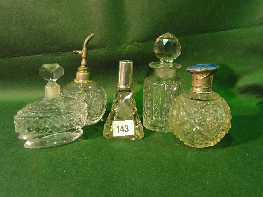 Appraisal: A collection of glass scent bottles and other dressing table