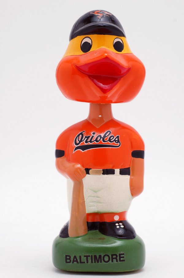 Appraisal: Circa - 's Baltimore Orioles bobblehead atop a green circular