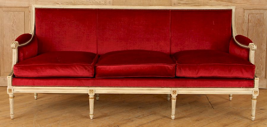 Appraisal: PAINTED FRENCH LOUIS XVI STYLE UPHOLSTERED SOFA A painted French