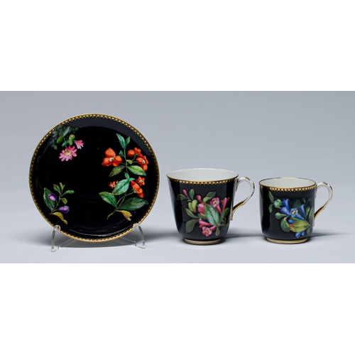 Appraisal: A Royal Worcester trio painted in bright enamels with scattered