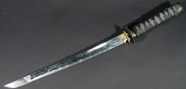 Appraisal: Japanese steel bladed sword with brass guard and shagreen handle