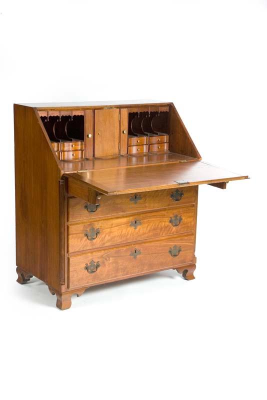 Appraisal: SLANT FRONT DESK Oak with twelve interior drawers ten interior