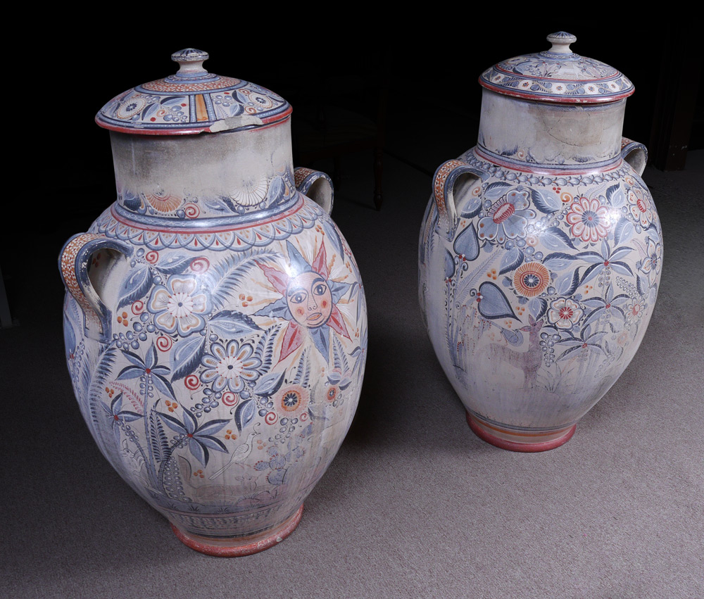 Appraisal: COVERED LARGE PAINTED TEMPLE JARS Decorative covered jars with lids