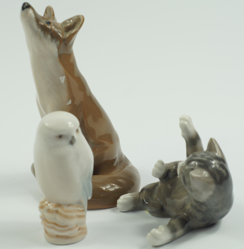 Appraisal: A Royal Copenhagen porcelain figure of a seated fox No