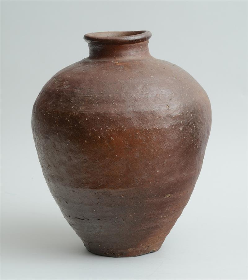 Appraisal: JAPANESE SHIGARAKI WARE STORAGE JAR The brown glazed ovoid bowl