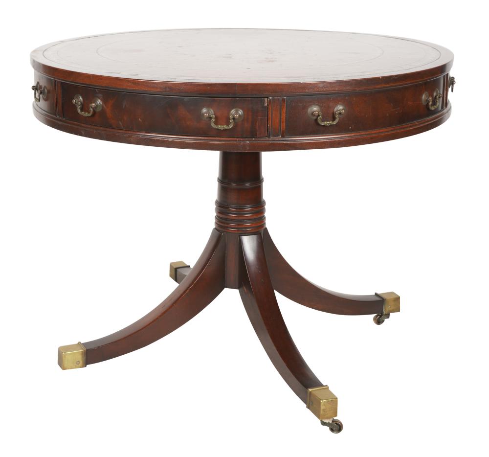 Appraisal: REGENCY-STYLE MAHOGANY DRUM TABLE th century the leather-inset top over