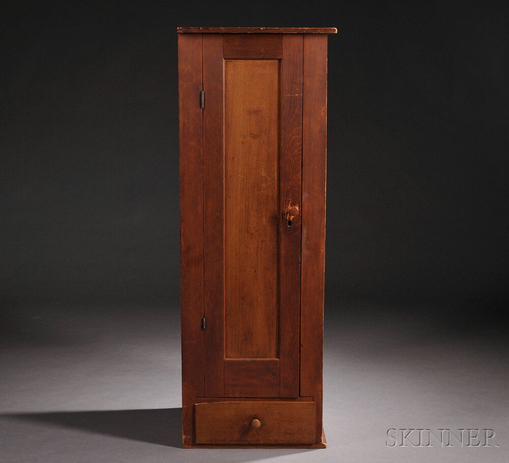 Appraisal: Shaker Single-door Cupboard with Drawer th century the paneled door