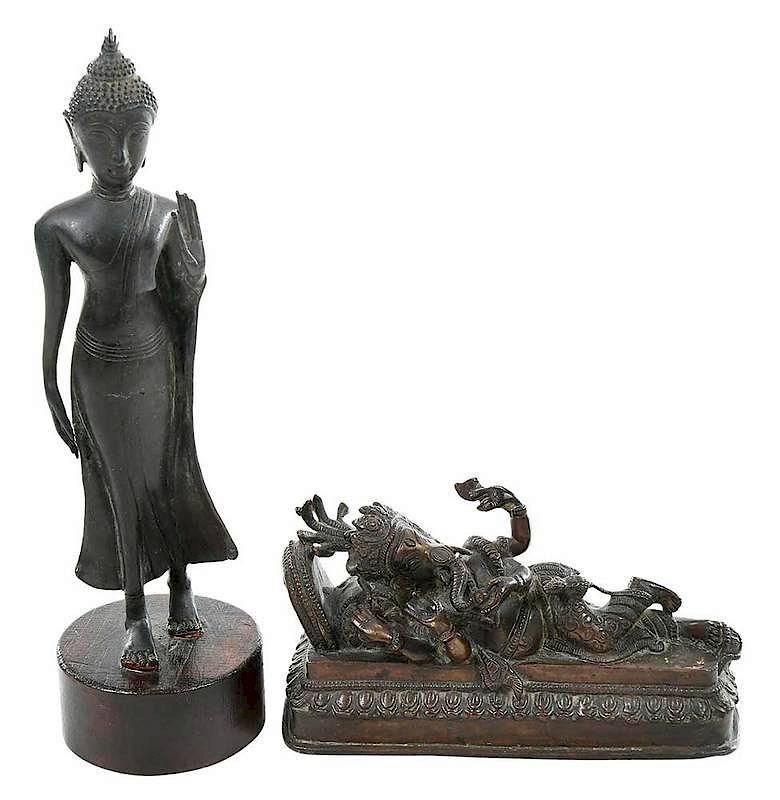 Appraisal: Two Asian Bronzes of Deity and Buddha Ganesha reclining on