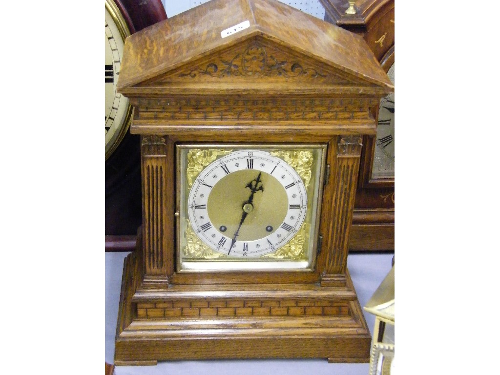 Appraisal: German oak ting tang mantel clock the square brass dial