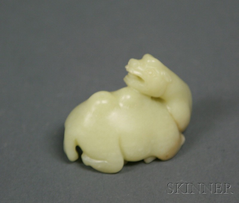 Appraisal: Jade Carving of a Camel uniform yellow stone lg in