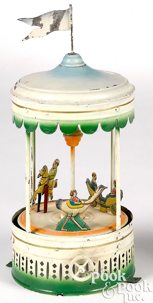 Appraisal: Painted and lithograph tin carousel steam toy Painted and lithograph