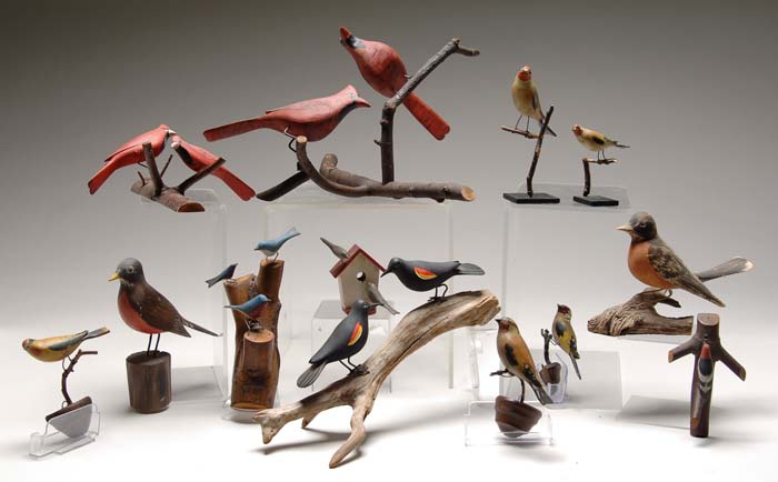 Appraisal: GROUP OF CARVED AND PAINTED WOOD BIRDS Groupings and singles