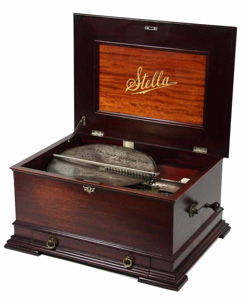 Appraisal: MUSIC BOX - Mahogany cased table top Stella disc music