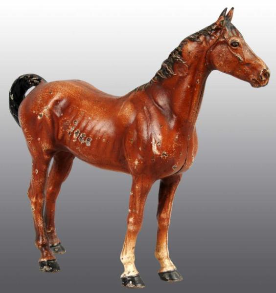 Appraisal: Large Cast Iron Horse Doorstop Description Made by Hubley cat