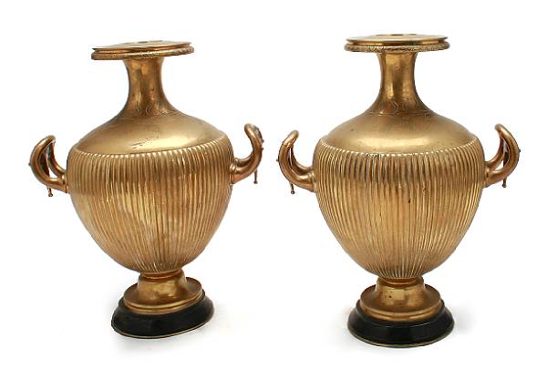 Appraisal: A pair of brass urns height in