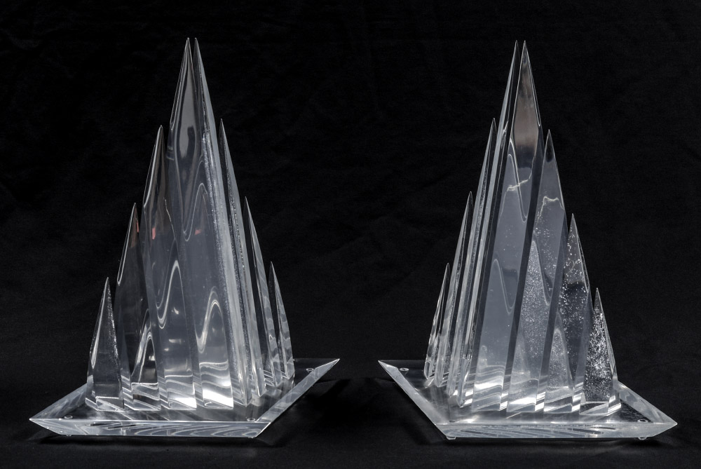 Appraisal: PAIR HIVO VAN TEAL LUCITE SCULPTURES Pyramid form with series