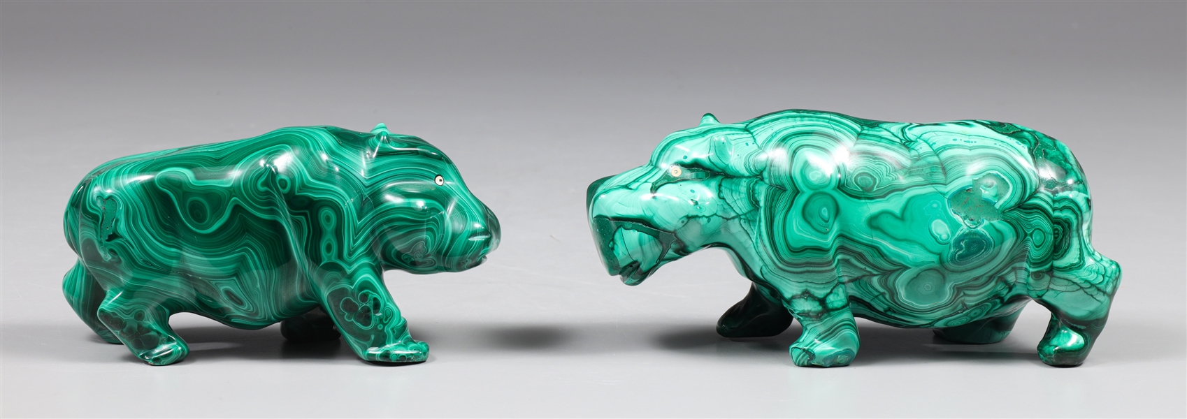 Appraisal: Two Malachite carvings each in the form of a hippopotamus