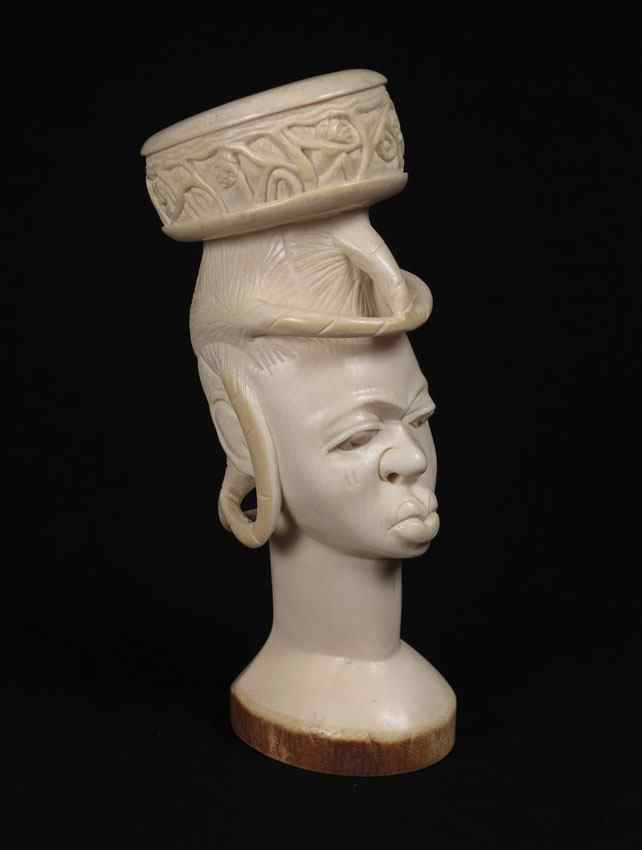 Appraisal: CARVED AFRICAN IVORY FIGURAL BUST Carved from a single piece