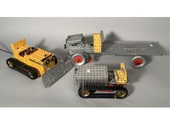 Appraisal: Three vintage constructed Erector set toys including Yellow painted electric