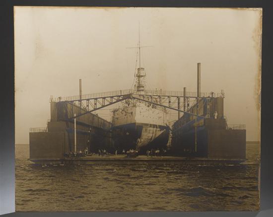 Appraisal: Photography Photogravure of a ship in a floating drydock barge