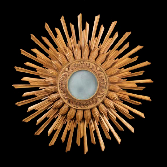 Appraisal: Italian Carved Fruitwood Tiered Sunburst Looking Glass in the Directoire