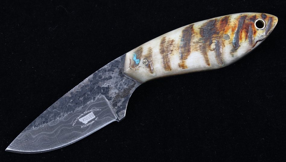 Appraisal: M T Knives Rams Horn Damascus Hammered Knife This is