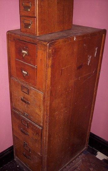 Appraisal: An oak filing cabinet cm wide and a two drawer