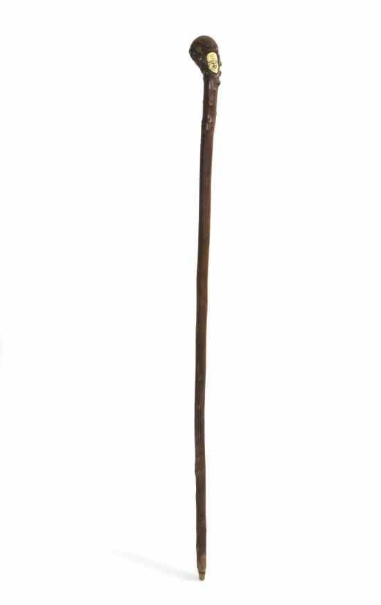 Appraisal: A Burlwood and Japanese Ivory Mounted Walking Stick headed by