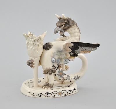 Appraisal: Porcelain Gryphon Candleholder by Royal Rudolstadt Thuringia Germany In the