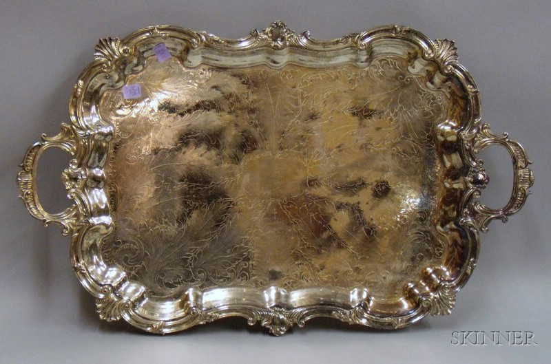 Appraisal: Silver Plated Handled and Footed Tea Tray lg in