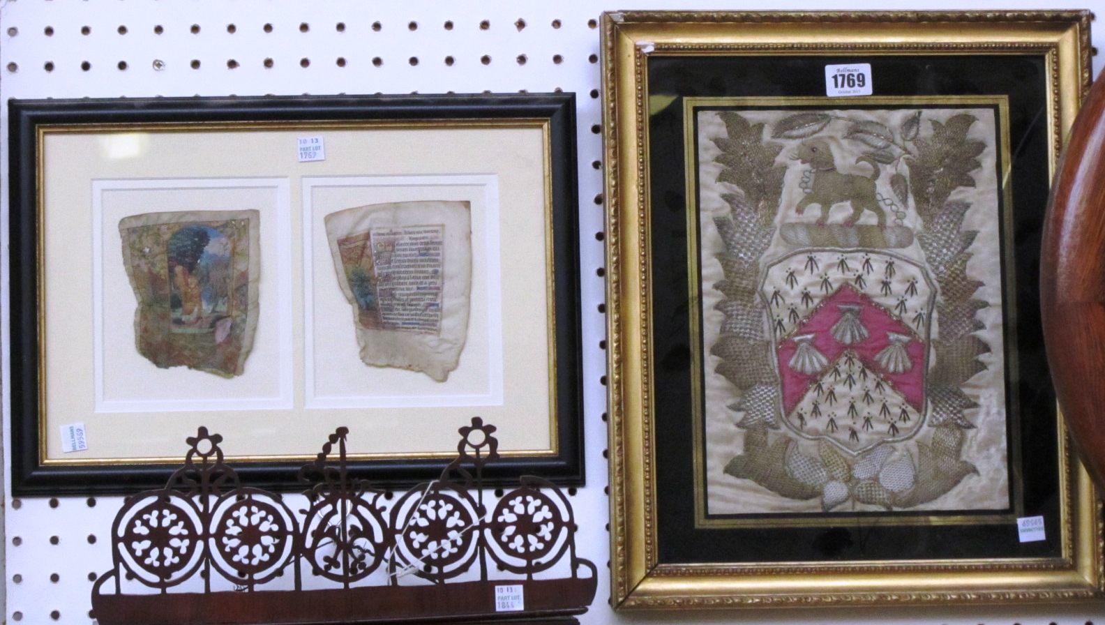 Appraisal: Two framed pages from books of hours and a needlework