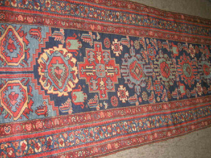 Appraisal: HAMADAN LONG RUG The indigo field of geometric floral and