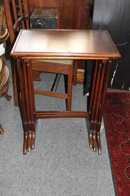 Appraisal: A NEST OF THREE MAHOGANY RECTANGULAR OCCASIONAL TABLES wide