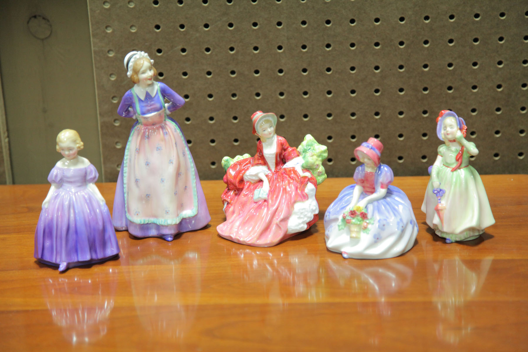 Appraisal: FIVE ROYAL DOULTON FIGURES English th century Marie HN ''h