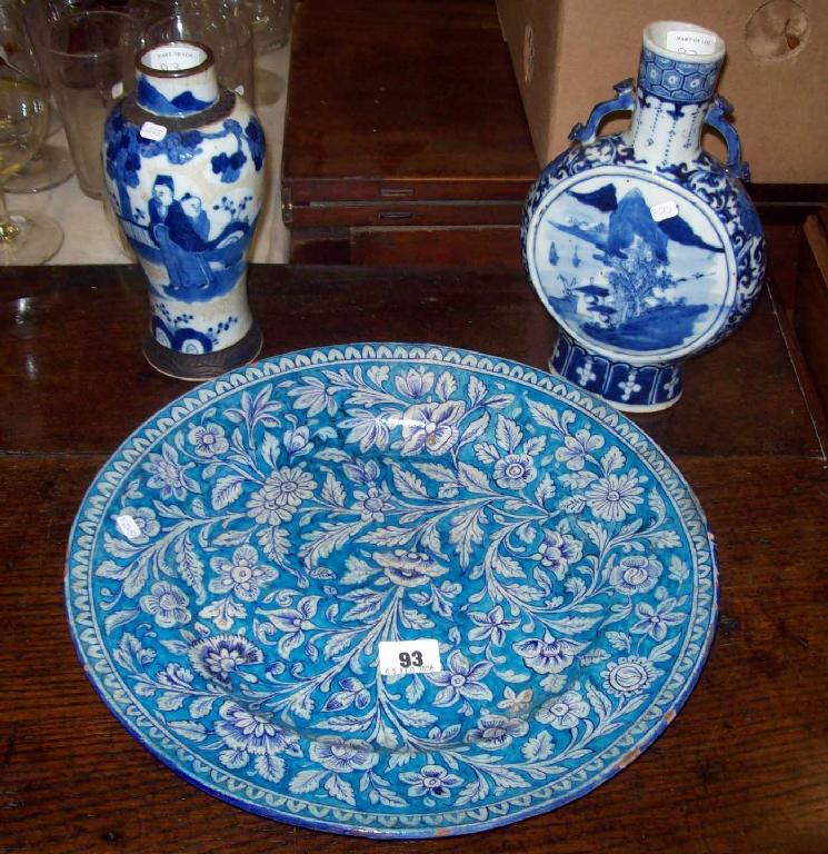 Appraisal: A tin glazed blue and white charger and two Oriental