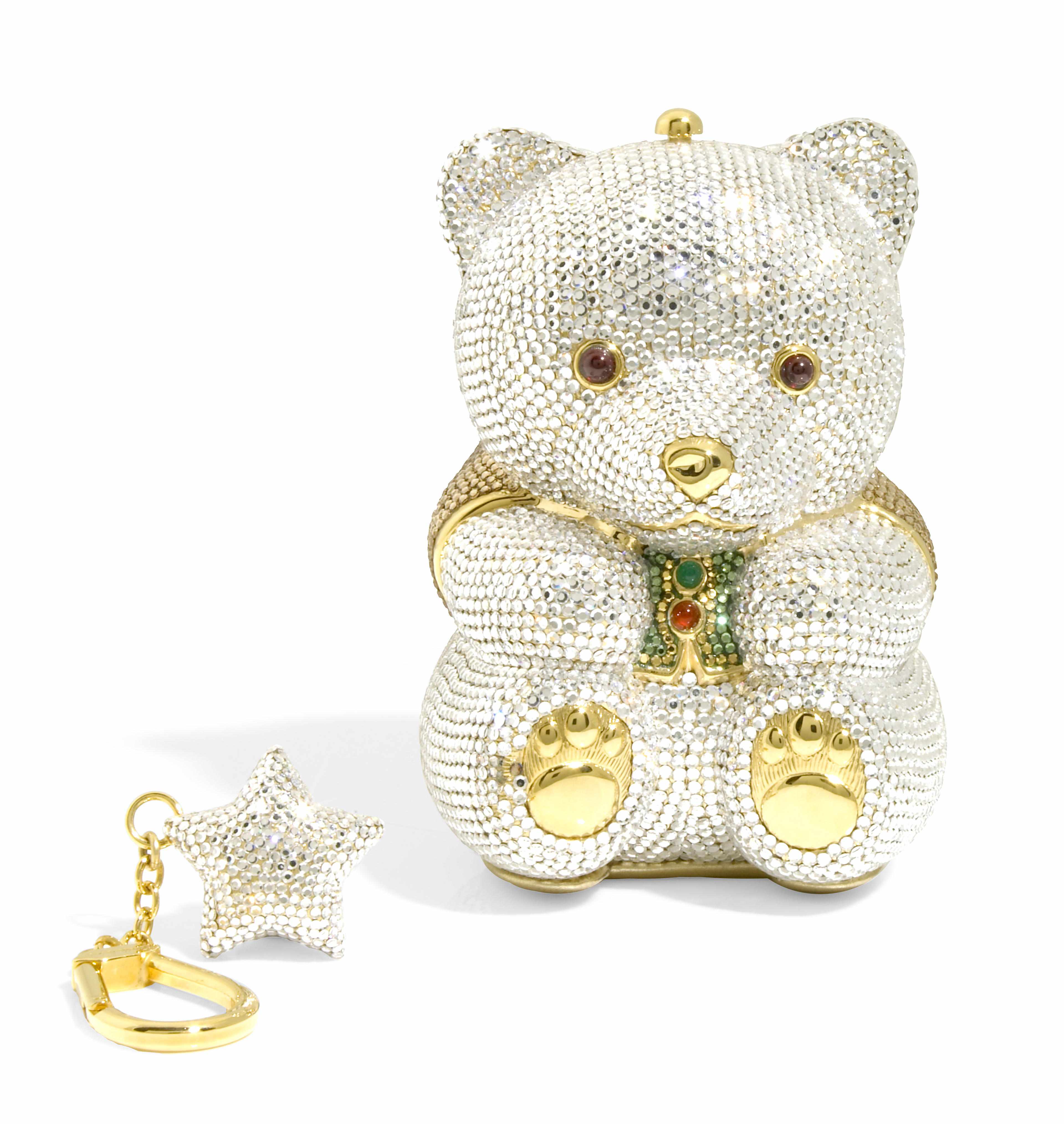 Appraisal: A silver crystal bear minaudiere with a green and gold